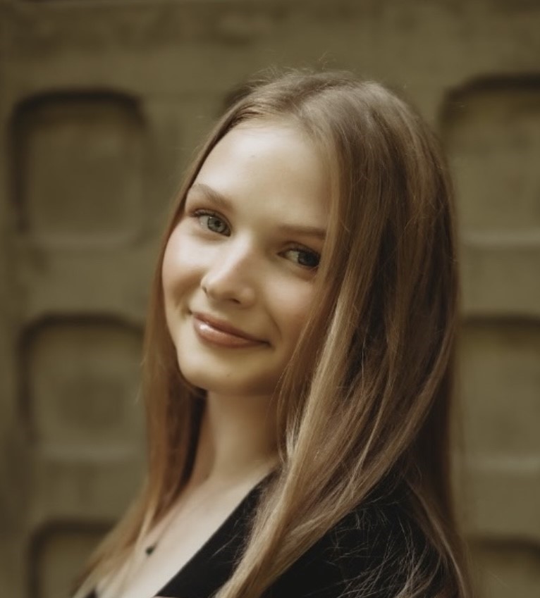 A professional portrait of Sophia. 