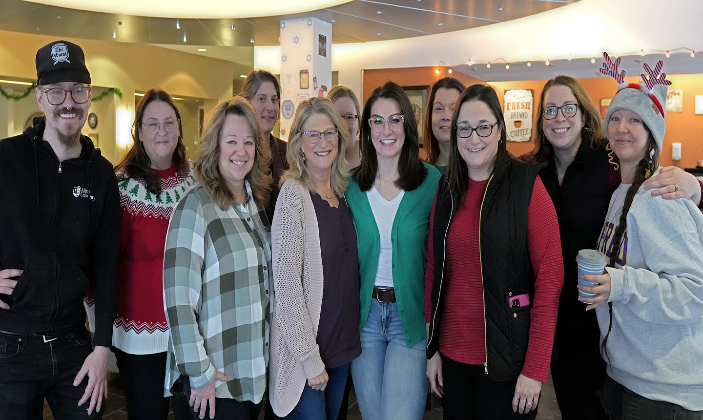 A group of people smiling