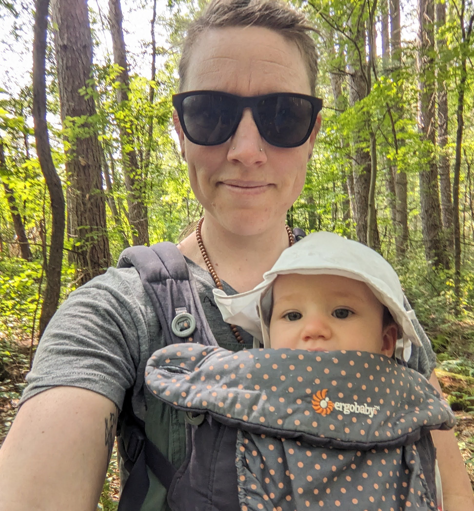 Photo of Chloe Hansen holding a baby